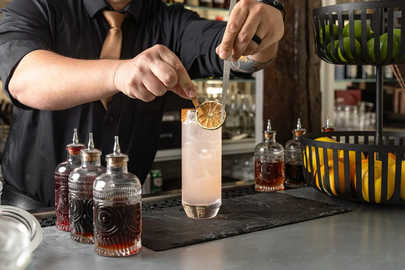 A drink garnished at the bar