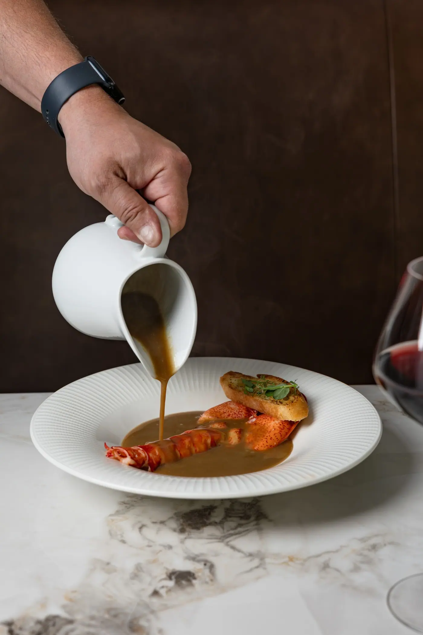 A sauce poured over a plated dish