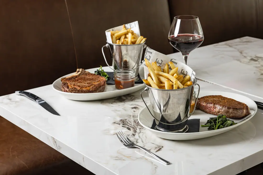 Steak frites with a glass of red